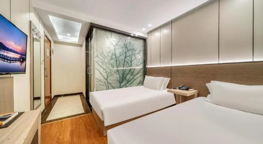 Bed in Vatica ShangHai Pudong Airport Disney Huaxia(E) Road Metro Station Hotel .