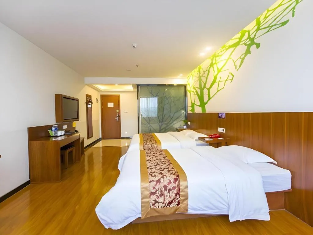 Bed in Vatica ShangHai Pudong Airport Disney Huaxia(E) Road Metro Station Hotel .