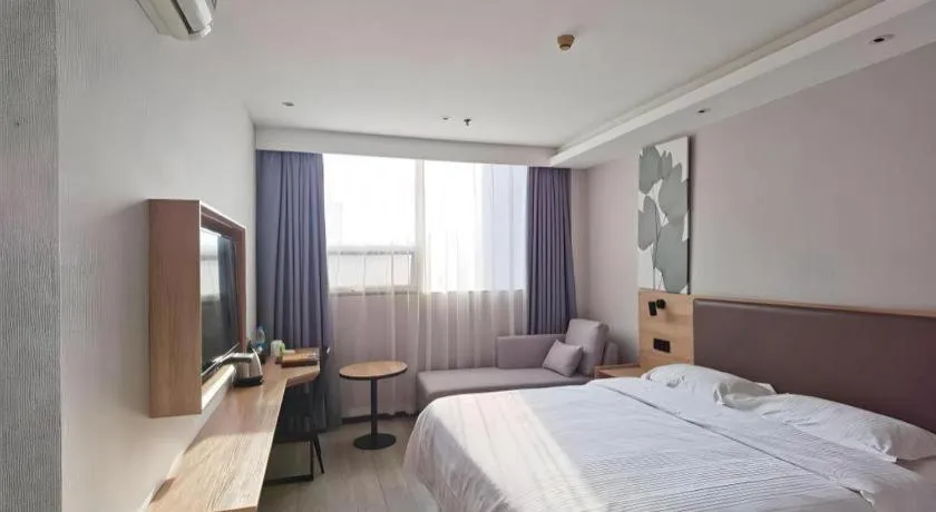 Bed in GreenTree Inn Nanjing Dachang Getang Metro Station Express Hotel