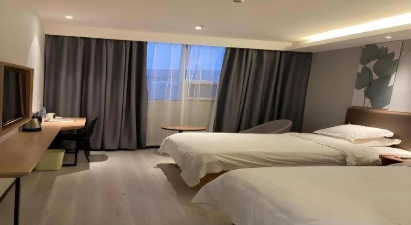 Bed in GreenTree Inn Nanjing Dachang Getang Metro Station Express Hotel