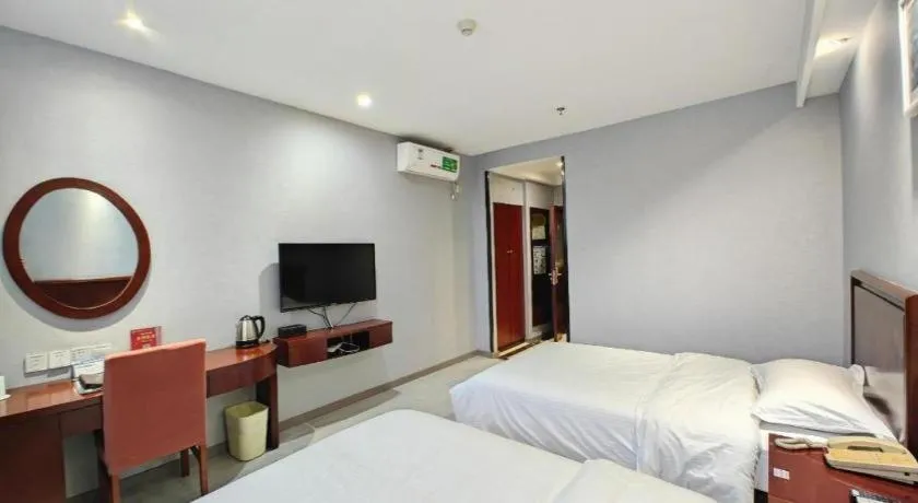 Bed in GreenTree Inn Nanjing Dachang Getang Metro Station Express Hotel