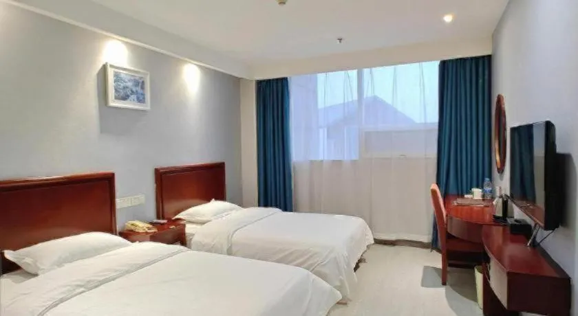 Bed in GreenTree Inn Nanjing Dachang Getang Metro Station Express Hotel