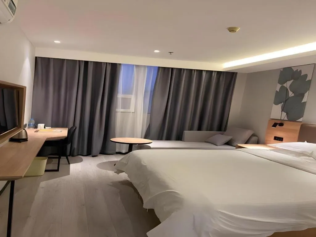 Bed in GreenTree Inn Nanjing Dachang Getang Metro Station Express Hotel