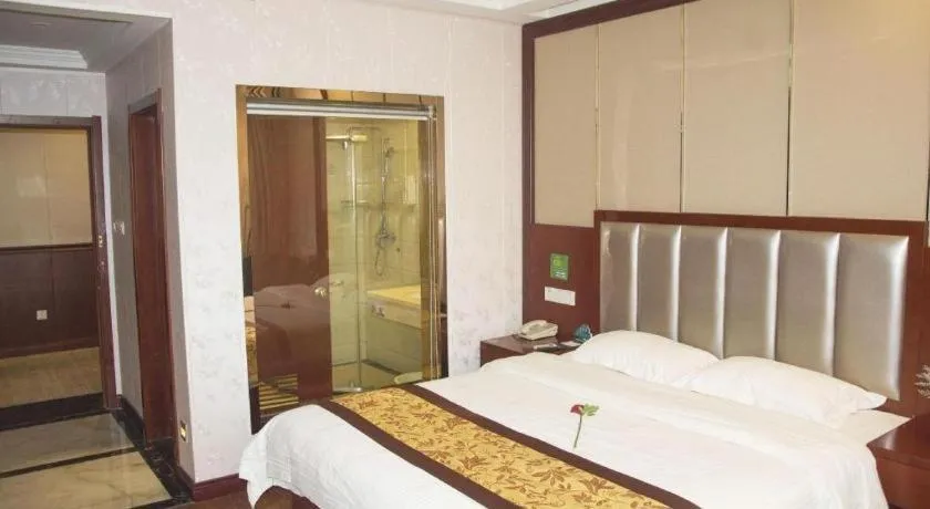 Bed in GreenTree Inn JiangSu Wuxi Jiangyin City QinGYAng Town Fuqian Road Express Hotel