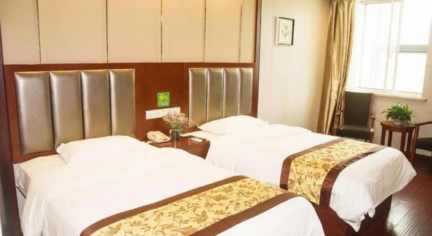 Bed in GreenTree Inn JiangSu Wuxi Jiangyin City QinGYAng Town Fuqian Road Express Hotel