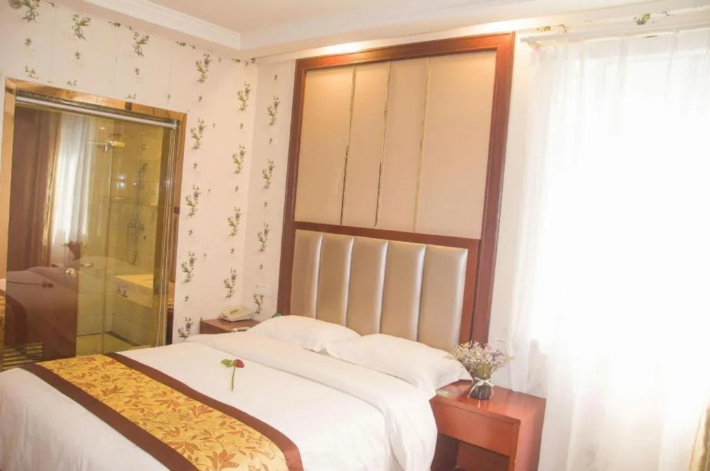 Bed in GreenTree Inn JiangSu Wuxi Jiangyin City QinGYAng Town Fuqian Road Express Hotel