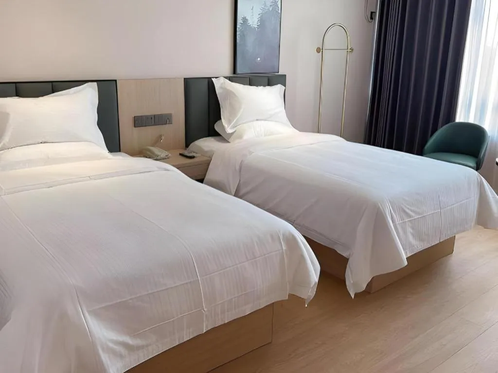 Bed in GreenTree Inn Chizhou Pingtian Lake Qingfeng Avenue Business Hotel