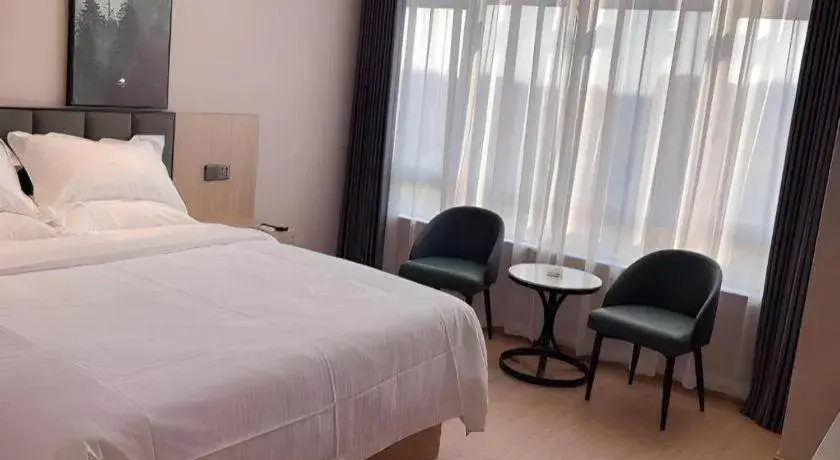 Bed in GreenTree Inn Chizhou Pingtian Lake Qingfeng Avenue Business Hotel Bed in GreenTree Inn Chizhou Pingtian Lake Qingfeng Avenue Business Hotel