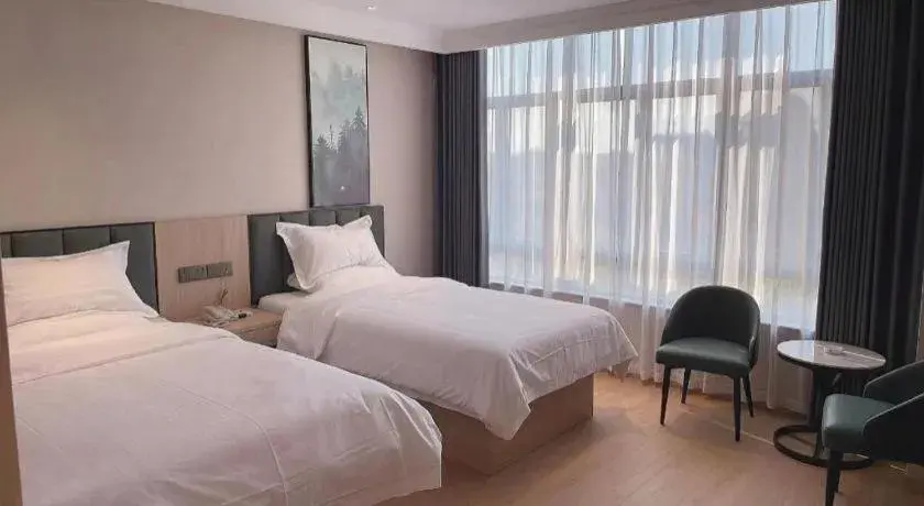 Bed in GreenTree Inn Chizhou Pingtian Lake Qingfeng Avenue Business Hotel Bed in GreenTree Inn Chizhou Pingtian Lake Qingfeng Avenue Business Hotel