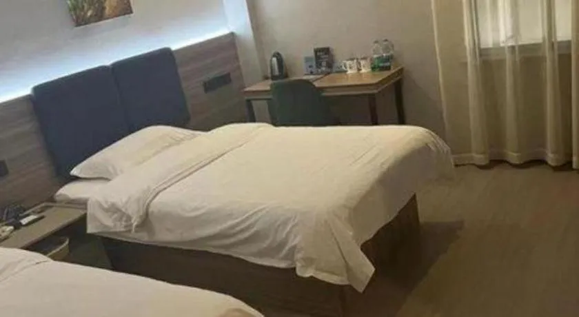 Bed in GreenTree Inn Shanghai MinHang ZhuanQiao Subway Station East ZhuanXing Road Shell Hotel