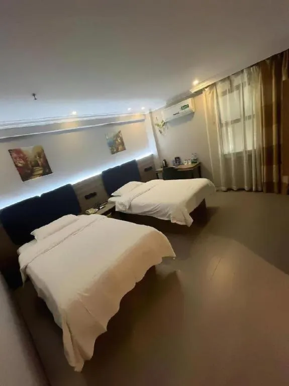 Bed in GreenTree Inn Shanghai MinHang ZhuanQiao Subway Station East ZhuanXing Road Shell Hotel
