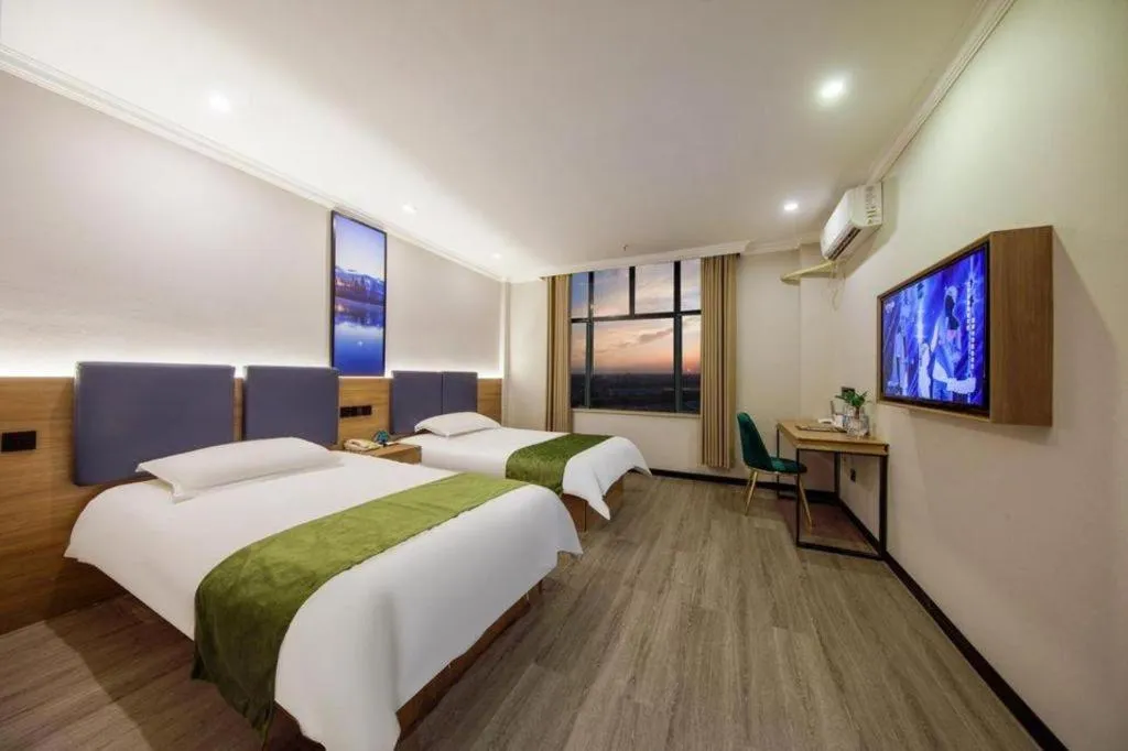 Bed in GreenTree Inn Shanghai MinHang ZhuanQiao Subway Station East ZhuanXing Road Shell Hotel