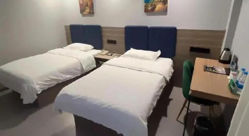 Bed in GreenTree Inn Shanghai MinHang ZhuanQiao Subway Station East ZhuanXing Road Shell Hotel