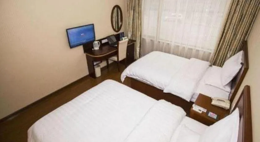 Bed in GreenTree Inn Shanghai Hongqiao Airport Huqingping Highway Shell Hotel
