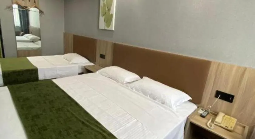 Bed in GreenTree Inn Wuhu Fangte Second Phase Nanxiang Wanshang Express Hotel