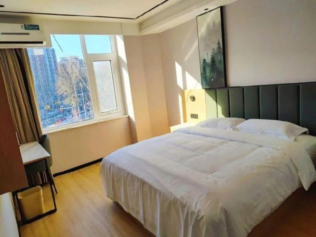 Bed in GreenTree Inn Langfang GuanGYAng District GuanGYAng Road City Government Express Hotel