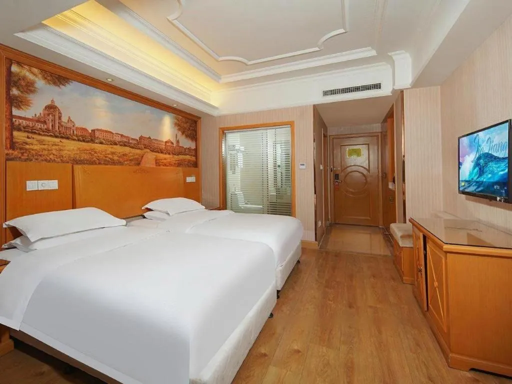 Bed in Vienna International Hotel Lhasa Potala Palace