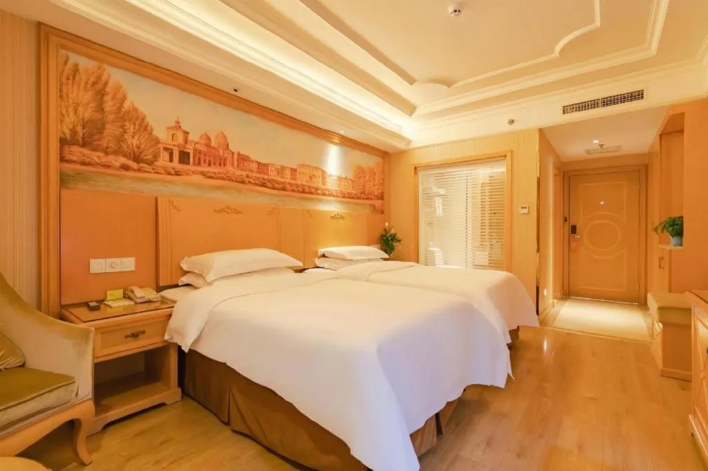 Bed in Vienna International Hotel Lhasa Potala Palace