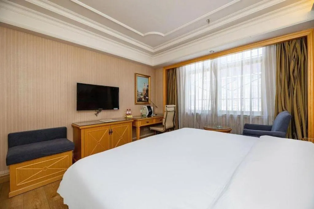 Bed in Vienna International Hotel Lhasa Potala Palace