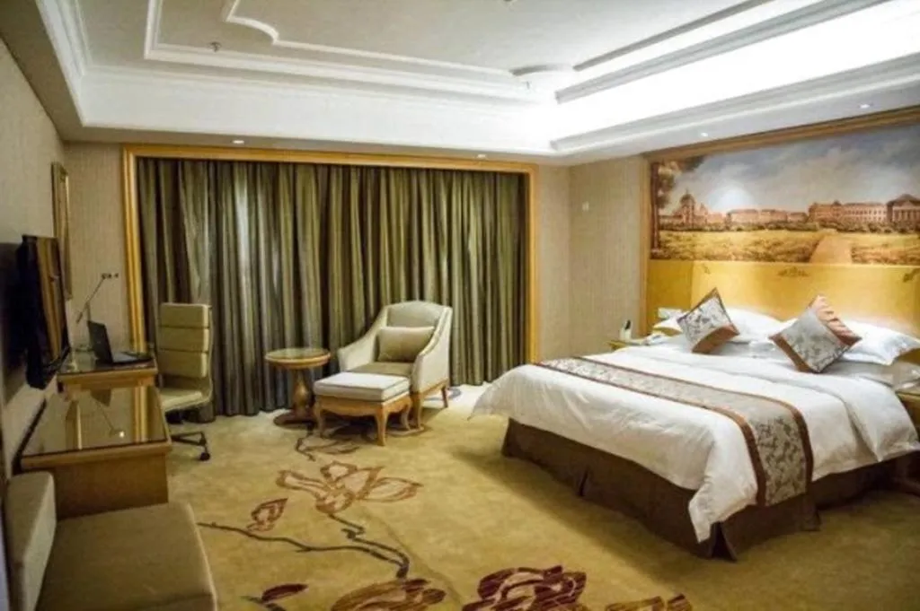 Bed in Vienna International Hotel Lhasa Potala Palace