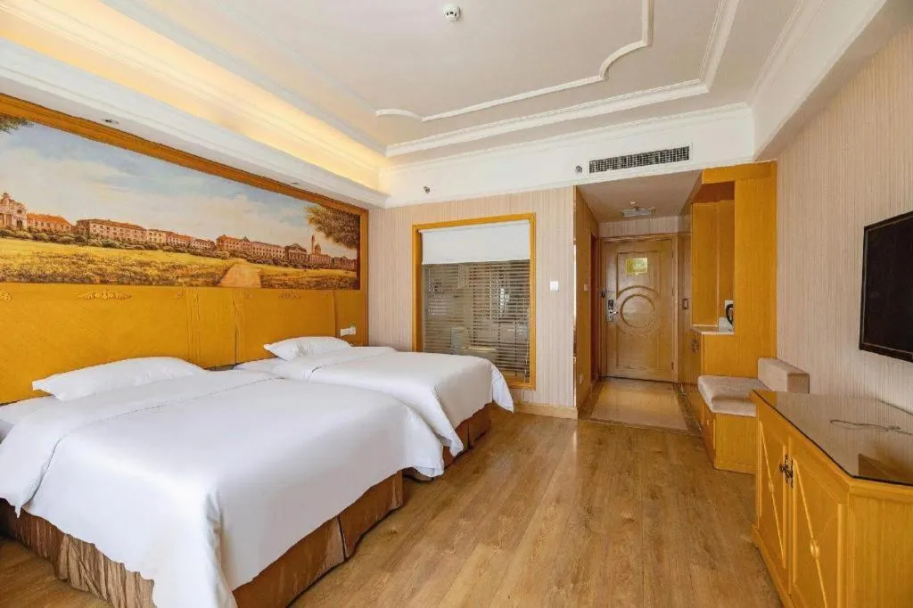 Bed in Vienna International Hotel Lhasa Potala Palace