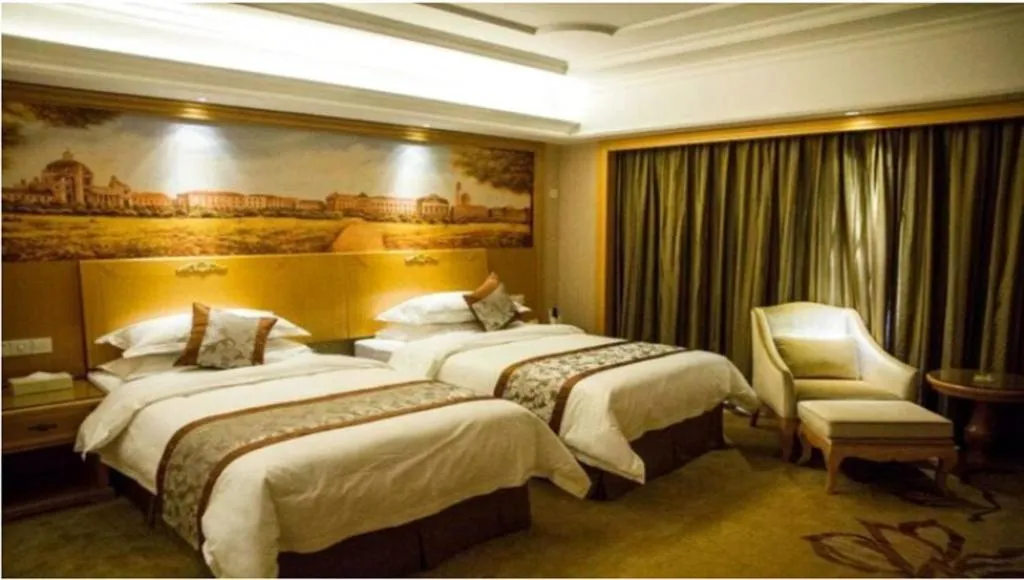 Bed in Vienna International Hotel Lhasa Potala Palace