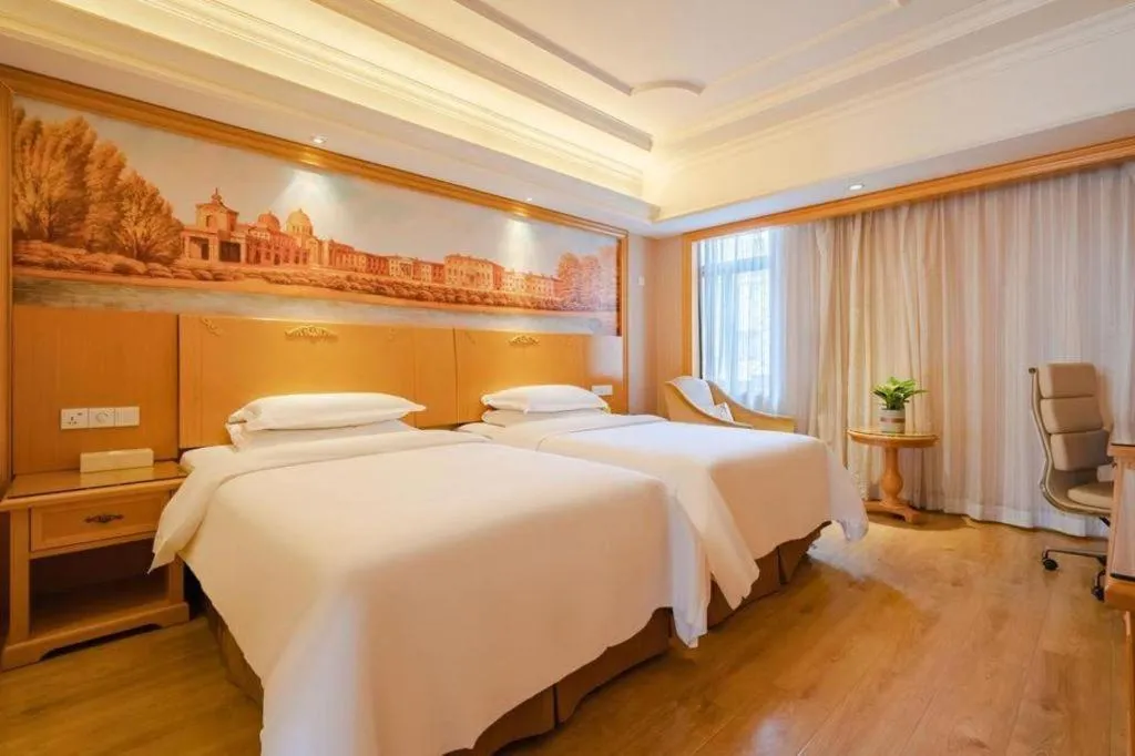 Bed in Vienna International Hotel Lhasa Potala Palace