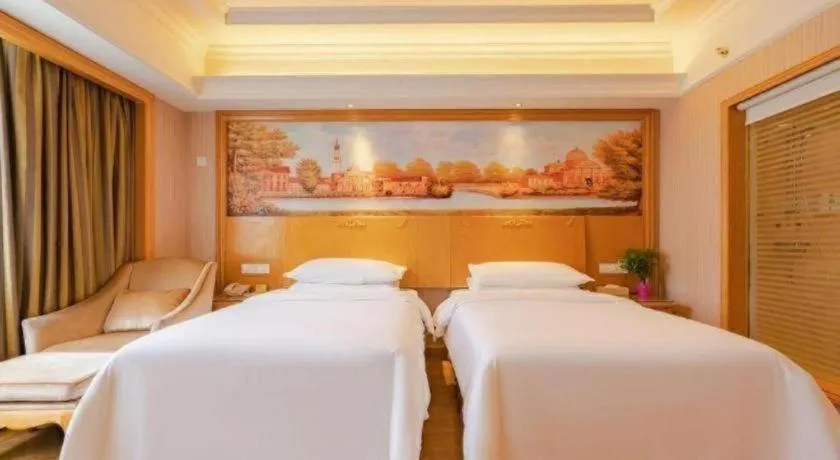 Bed in Vienna International Hotel Lhasa Potala Palace