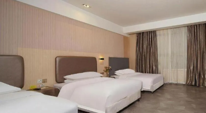 Bed in Vienna International Hotel Lhasa Potala Palace