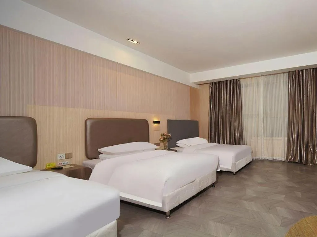 Bed in Vienna International Hotel Lhasa Potala Palace