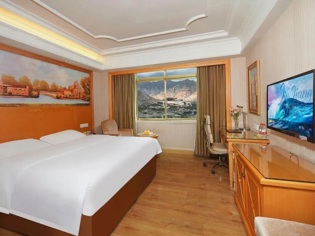 Bed in Vienna International Hotel Lhasa Potala Palace