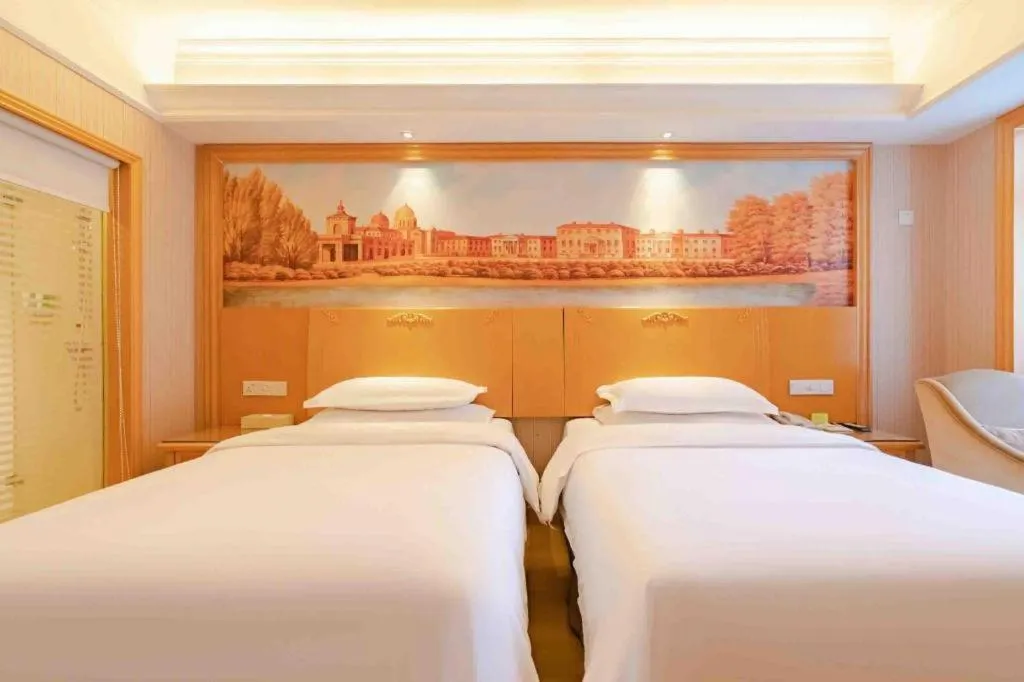 Bed in Vienna International Hotel Lhasa Potala Palace