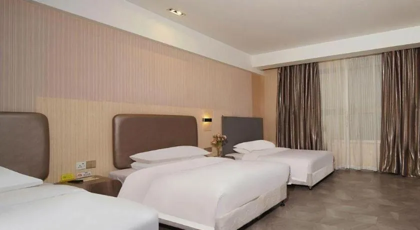 Bed in Vienna International Hotel Lhasa Potala Palace