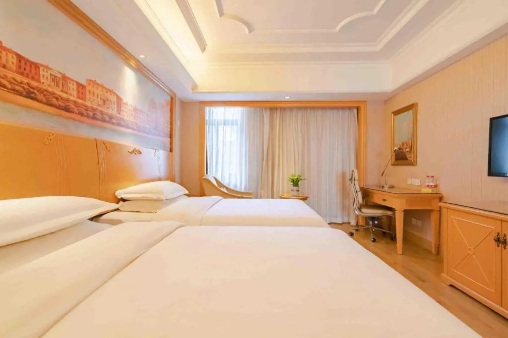 Bed in Vienna International Hotel Lhasa Potala Palace