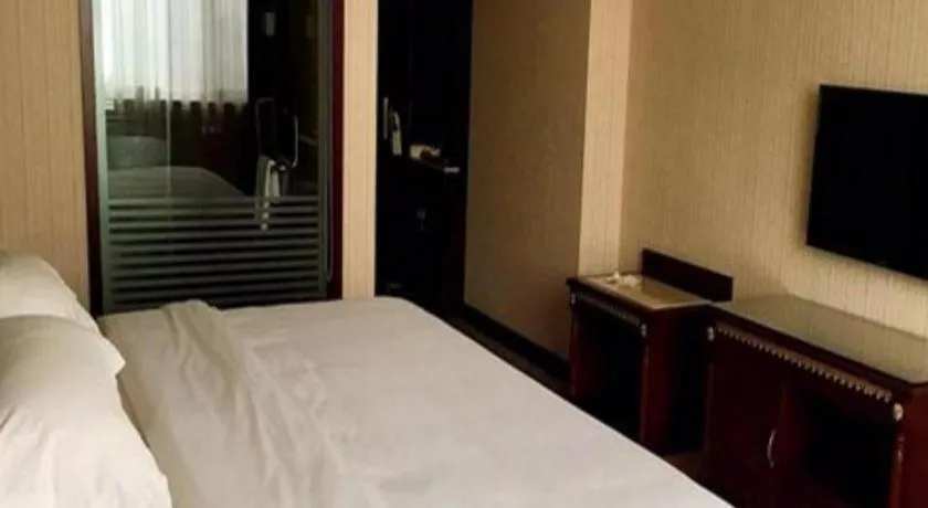 Bed in Vienna Hotel Qingdao Jiaozhou Branch