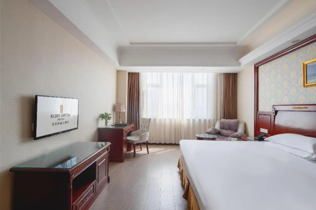 Bed in Vienna Hotel Qingdao Jiaozhou Branch