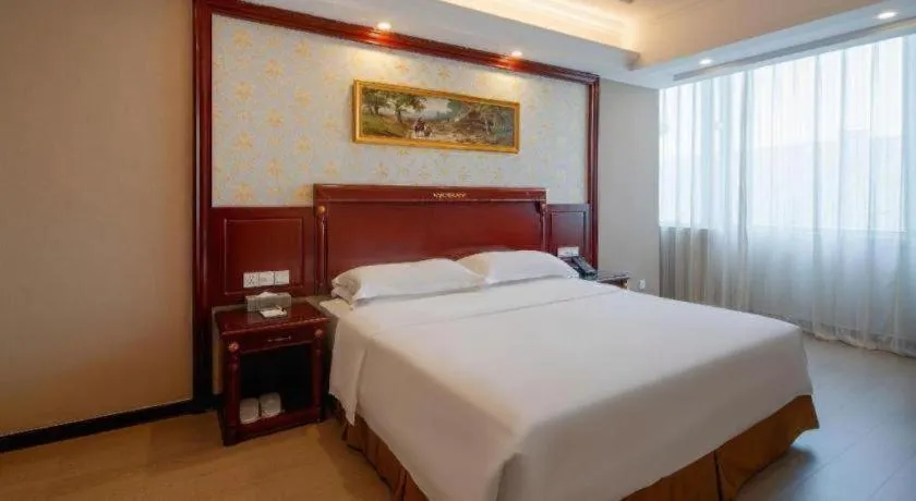 Bed in Vienna Hotel Qingdao Jiaozhou Branch