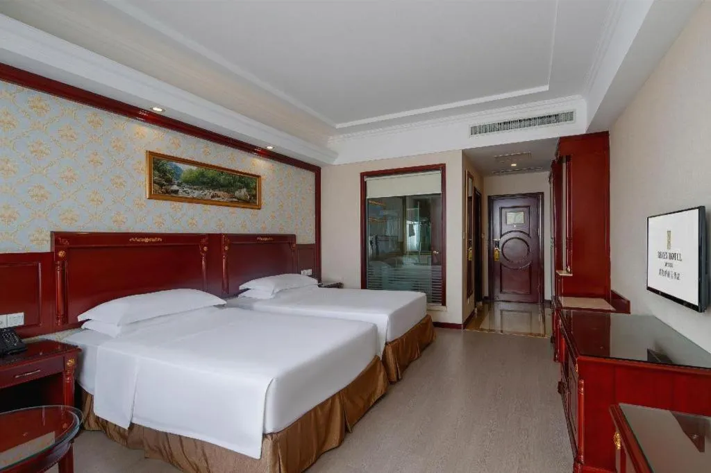 Bed in Vienna Hotel Qingdao Jiaozhou Branch
