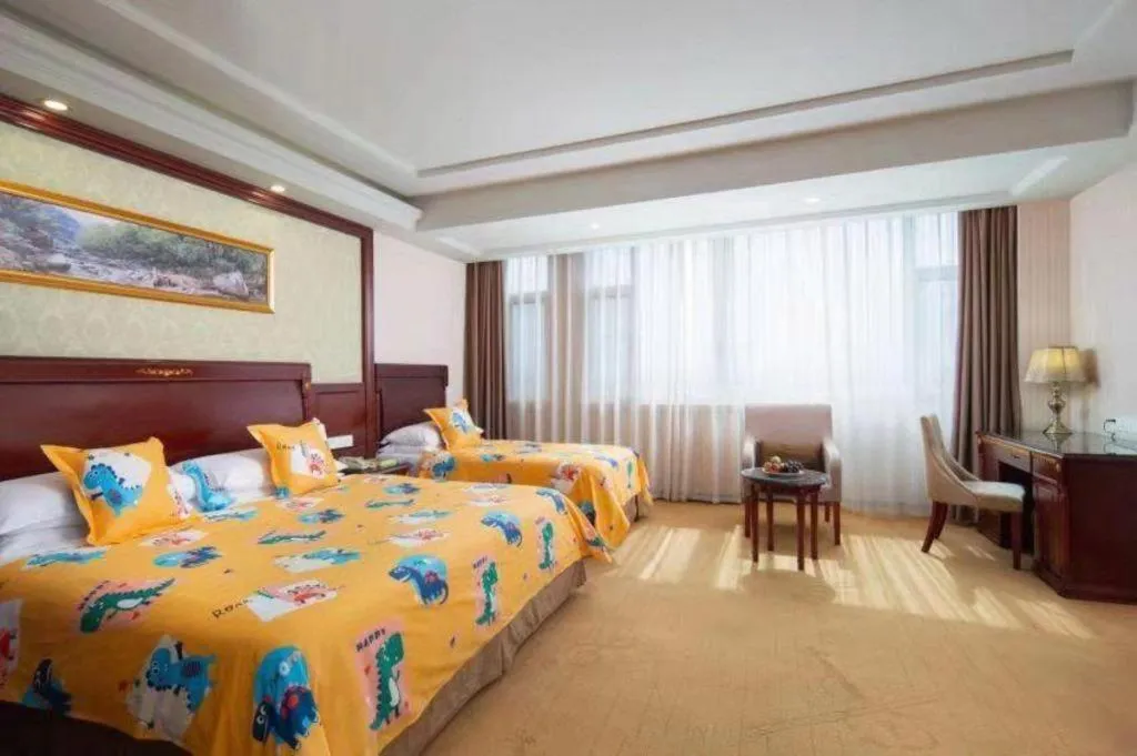Bed in Vienna Hotel Qingdao Jiaozhou Branch