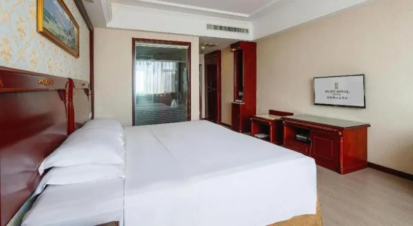 Bed in Vienna Hotel Qingdao Jiaozhou Branch