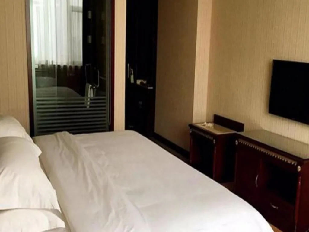 Bed in Vienna Hotel Qingdao Jiaozhou Branch