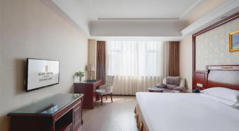 Bed in Vienna Hotel Qingdao Jiaozhou Branch
