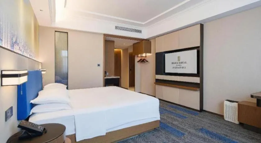 Bed in Vienna Hotel Qingdao Jiaozhou Branch