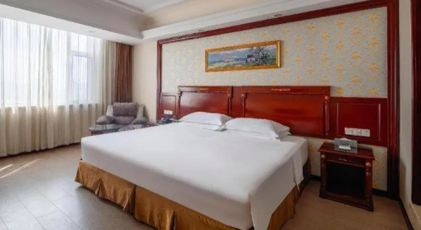 Bed in Vienna Hotel Qingdao Jiaozhou Branch