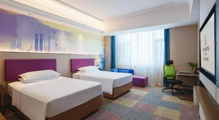 Bed in Vienna Hotel Qingdao Jiaozhou Branch