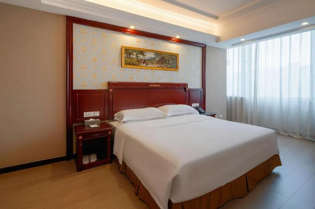 Bed in Vienna Hotel Qingdao Jiaozhou Branch