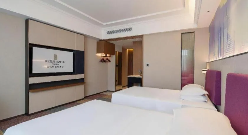 Bed in Vienna Hotel Qingdao Jiaozhou Branch