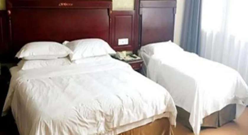 Bed in Vienna Hotel Qingdao Jiaozhou Branch
