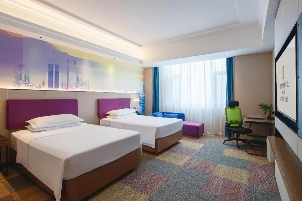 Bed in Vienna Hotel Qingdao Jiaozhou Branch