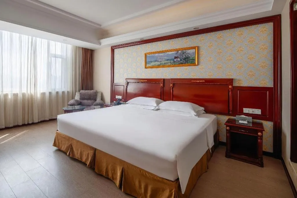 Bed in Vienna Hotel Qingdao Jiaozhou Branch